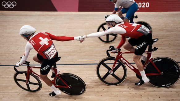 Team Switzerland competes during the track cycling men's madison race at the 2020 Summer Olympics, Saturday, Aug. 7, 2021, in Izu, Japan. (AP Photo/Thibault Camus)