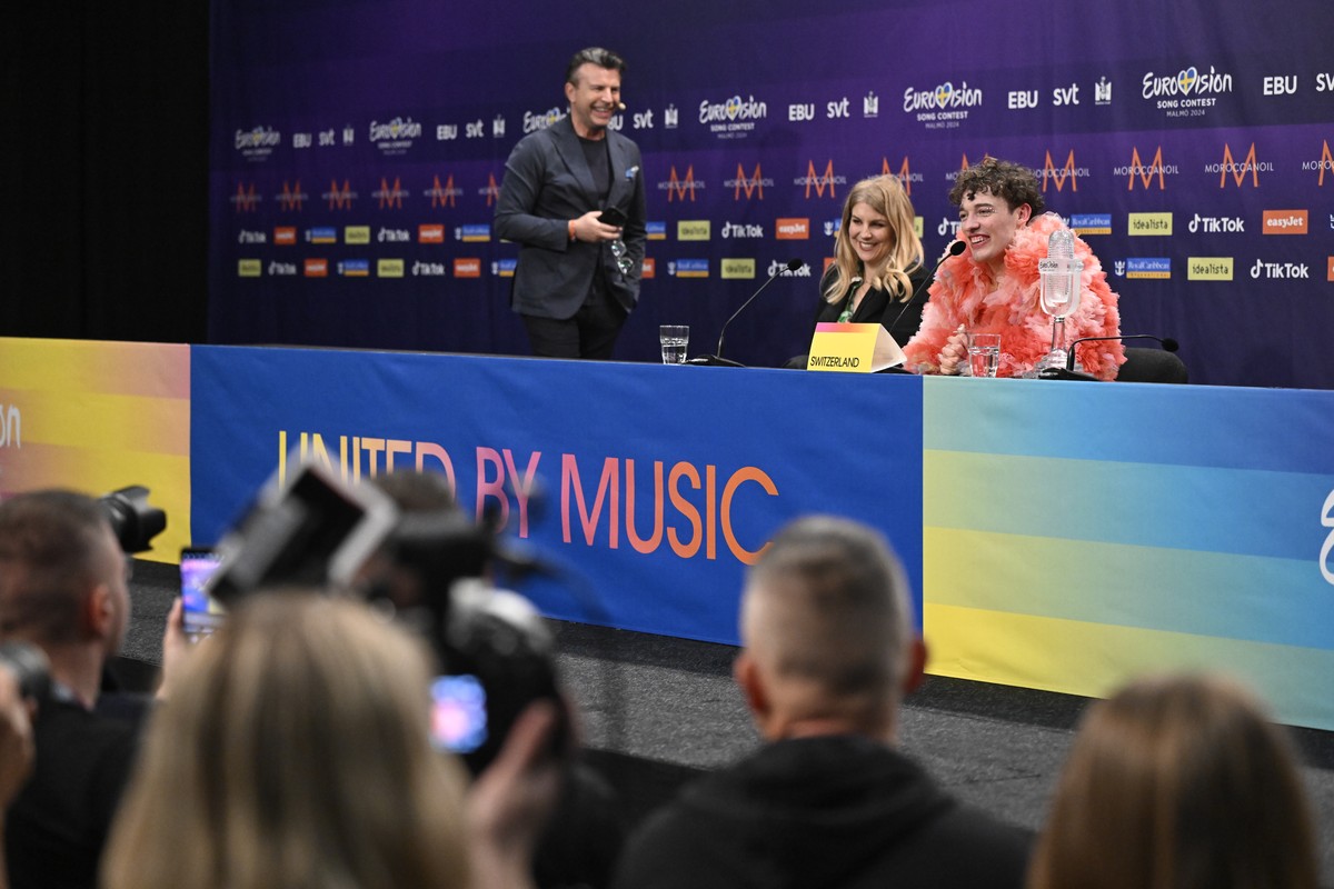 epa11334273 This year's winner Nemo (R) representing Switzerland during the press conference after the final of the 68th edition of the Eurovision Song Contest (ESC) at the Malmo Arena, in Malmo, ...