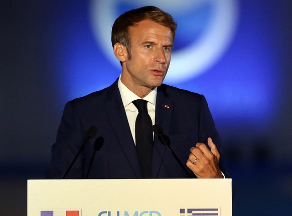 epa09473986 President of France Emmanuel Macron makes statements during the EUMed9 Summit, in Athens, Greece, 17 September 2021.The agenda of the Summit, which acquires special geopolitical weight, in ...