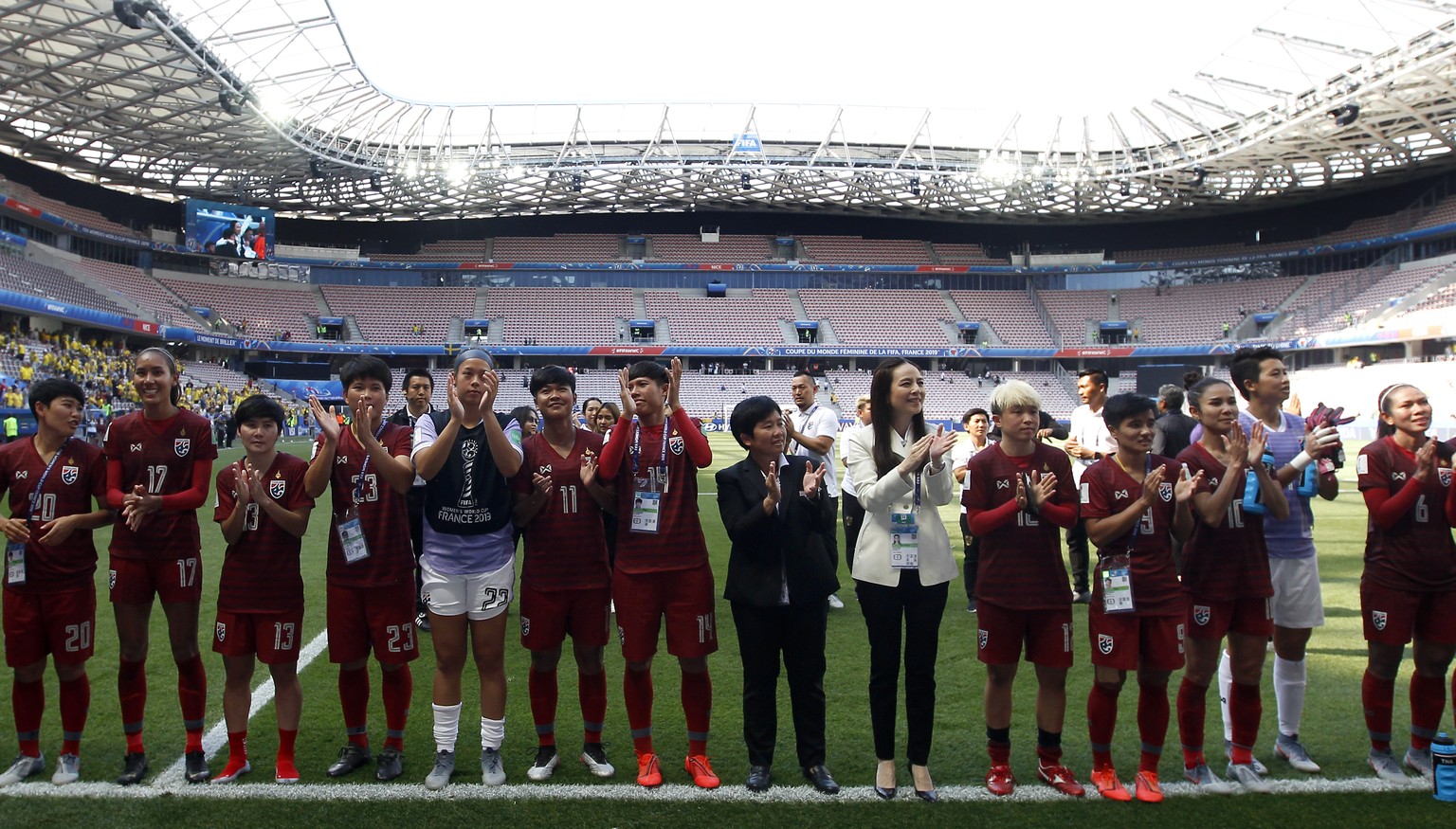 Thailand&#039;s players applaude in front of their supporters after the Women&#039;s World Cup Group F soccer match between Sweden and Thailand at the Stade de Nice in Nice, France, Sunday, June 16, 2 ...