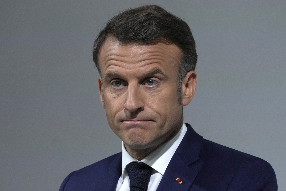 French President Emmanuel Macron reacts as he delivers a speech, Wednesday, June 12, 2024 in Paris. President Emmanuel Macron is addressing French voters on Wednesday for the first times since he has  ...