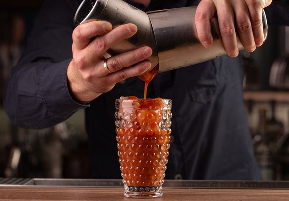 Bloody Mary Cocktail made by a barman - Cocktail shaker