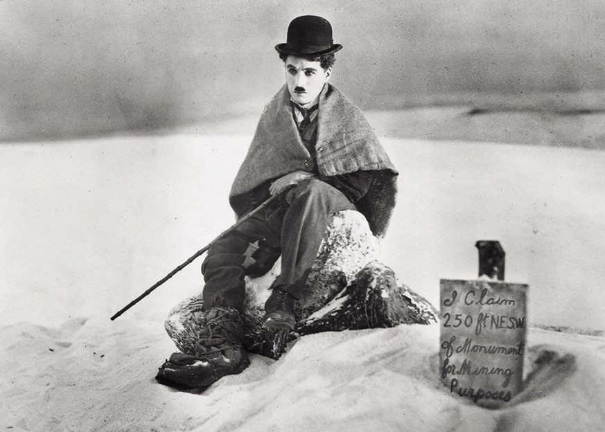 Legendary silent film actor-director Charlie Chaplin is shown in a scene from the 1925 silent film "The Gold Rush" in this promotional photo. Four of Chaplin's films "The Gold Rush ...