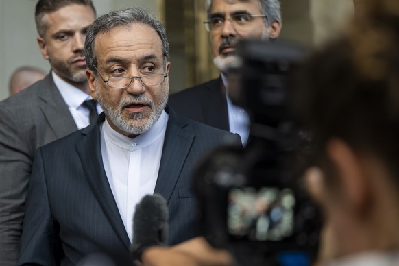 Iranian Foreign Minister Abbas Araghchi, talks to the media in front of the Intercontinental Hotel, after the meeting for the Iran-EU nuclear with the various foreign ministers of Germany, France, Gre ...