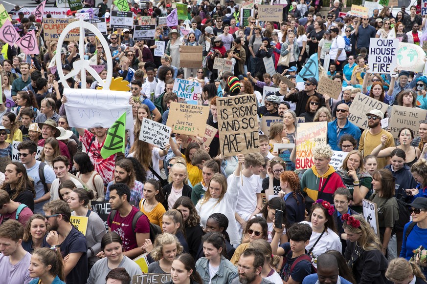 epa07856291 Protesters take part in the Global Climate Strike as they march to parliament in Cape Town, South Africa, 20 September 2019. Thousands of children across South Africa joined the global cal ...