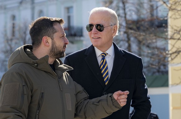 President Joe Biden, right, and Ukrainian President Volodymyr Zelenskyy talk during an unannounced visit in Kyiv, Ukraine, Monday, Feb. 20, 2023. (Ukrainian Presidential Press Office via AP)