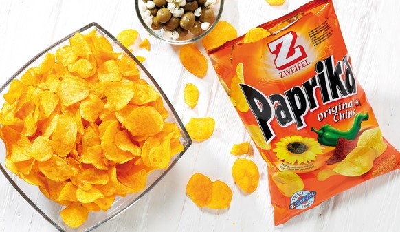 Seit 1964 die beliebtesten Chips im Sortiment: Zweifel Original Paprika Chips. Les meilleurs chips dans l&#039;assortiment depuis 1964: Zweifel Original Paprika Chips. Copyright: ARD Design Switzerlan ...