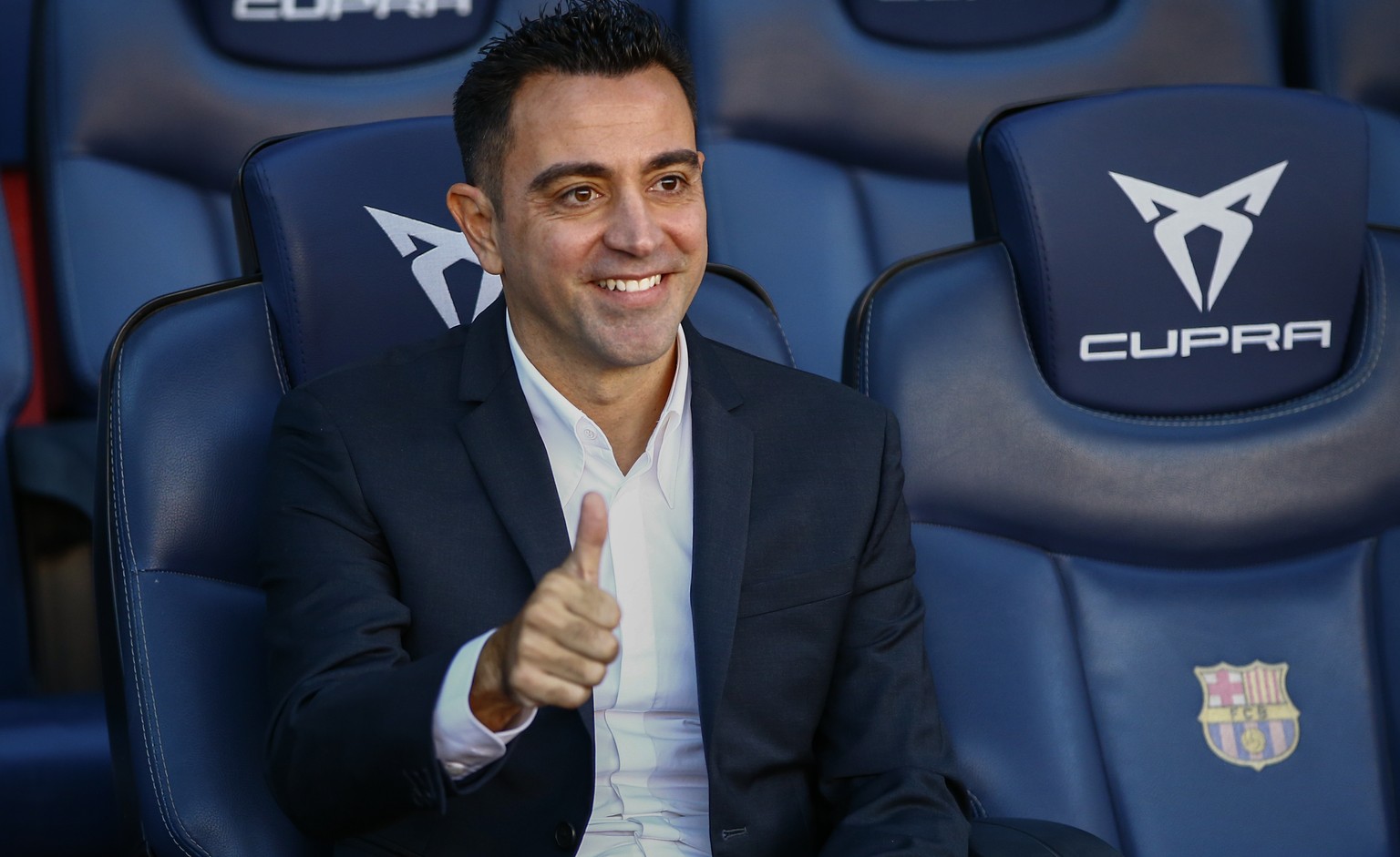FC Barcelona&#039;s new coach Xavi Hernandez gives a thumb up during his official presentation at the Camp Nou stadium in Barcelona, Spain, Monday, Nov. 8, 2021. Xavi, who thrived in Barcelona&#039;s  ...