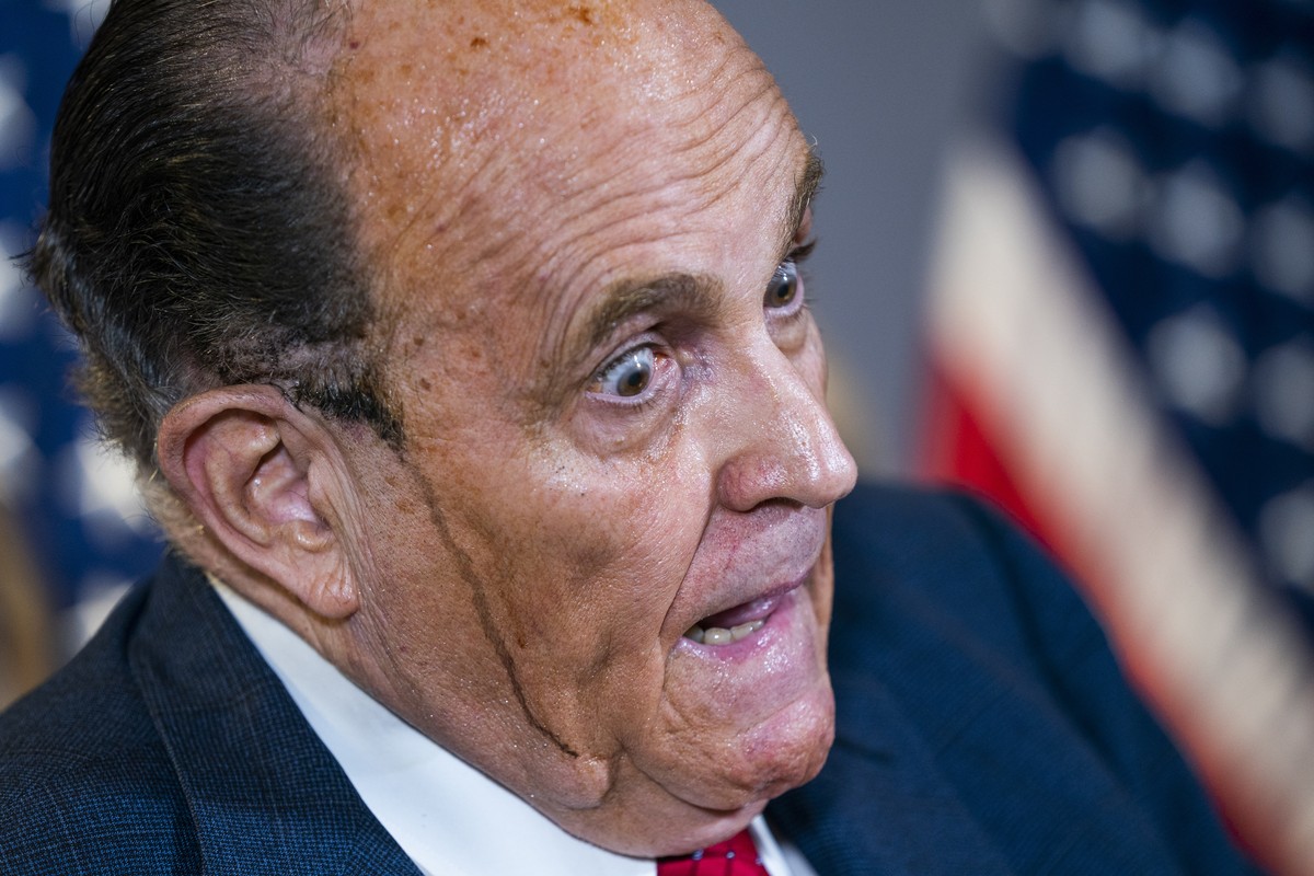 epaselect epa08829676 Lawyer to US President Donald J. Trump and former mayor of New York City Rudy Giuliani and Trump Campaign Senior Legal Advisor Jenna Ellis (not pictured) speak about the presiden ...
