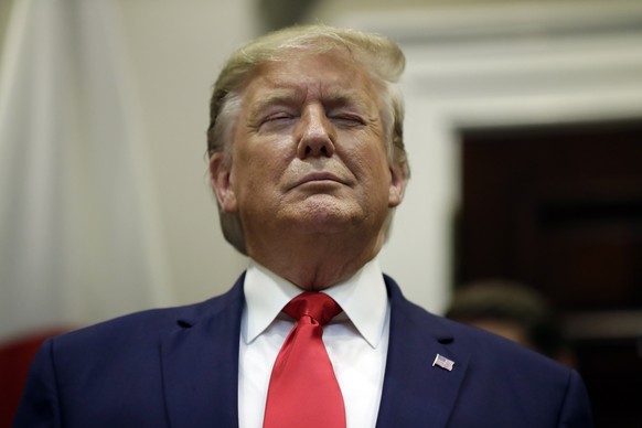 President Donald Trump listens during a signing ceremony for a trade agreement with Japan in the Roosevelt Room of the White House, Monday, Oct. 7, 2019, in Washington. (AP Photo/Evan Vucci)
Donald Tr ...