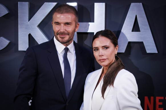 epa10898035 British former soccer player David Beckham (L) and his wife, British fashion designer Victoria Beckham attend the premiere of &#039;Beckham&#039; at the Curzon Mayfair, London, Britain, 03 ...