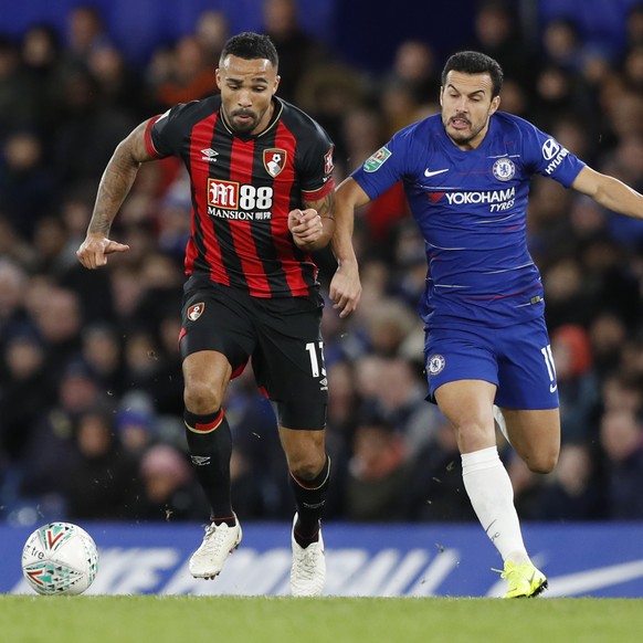 Bournemouth&#039;s Callum Wilson, 2nd left, chases the ball during a League Cup, quarterfinal soccer match between Chelsea and Bournemouth at the Stamford Bridge stadium in London, Wednesday Dec. 19,  ...