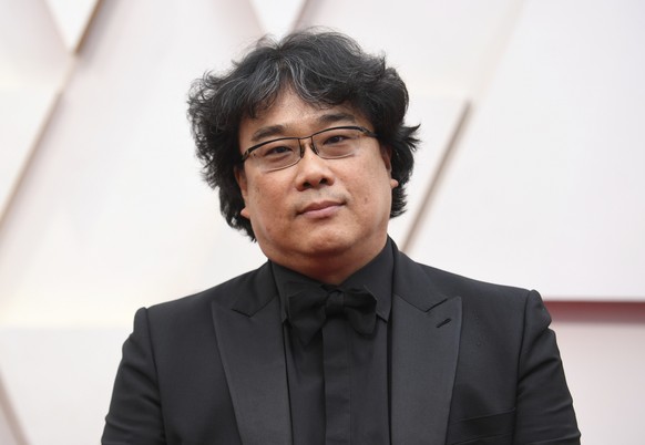 FILE - Bong Joon-ho arrives at the Oscars on Sunday, Feb. 9, 2020, in Los Angeles. The