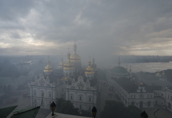 epaselect epa13038225 Ukrainian rescuers work at the site of a Russian strike on the Dormition Cathedral in Kyiv Pechersk Lavra in Kyiv, Ukraine, 15 June 2026, amid the Russian invasion of Ukraine. At ...