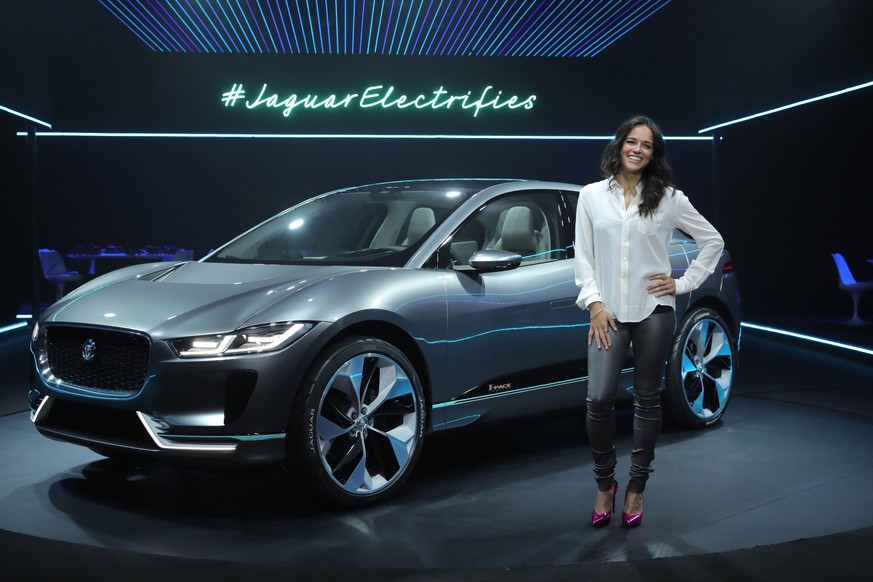 DISTRIBUTED FOR JAGUAR LANDROVER - Actress Michelle Rodriguez poses in front of Jaguar&#039;s first fully electric vehicle, the Jaguar I-PACE concept car, which was revealed for the first time in Los  ...