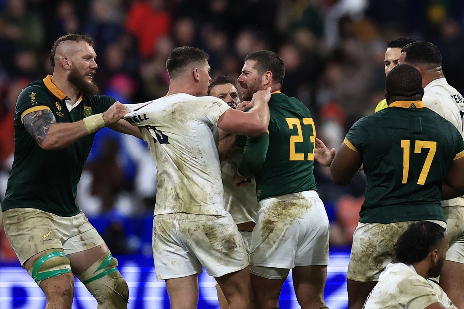 Players scuffle at the end of the Rugby World Cup semifinal match between England and South Africa at the Stade de France in Saint-Denis, near Paris, Saturday, Oct. 21, 2023. (AP Photo/Aurelien Moriss ...