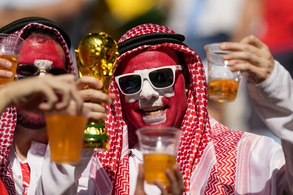 Switzerland&#039;s soccer team supporters cheer ahead of the World Cup group G soccer match between Switzerland and Cameroon, at the Al Janoub Stadium in Al Wakrah, Qatar, Thursday, Nov. 24, 2022. (AP ...