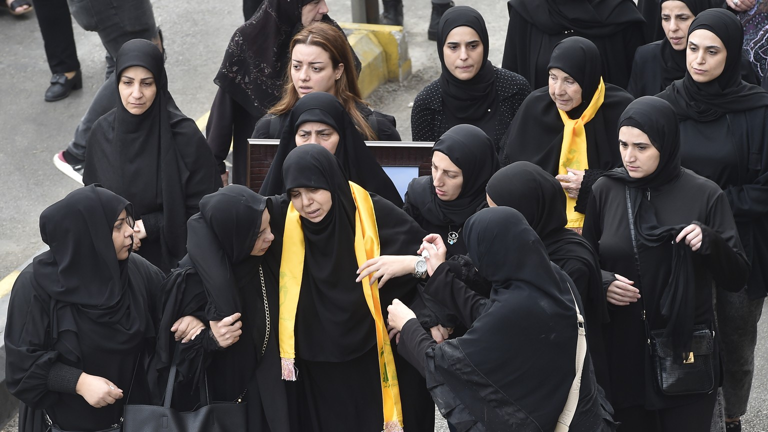 epa10969582 Supporters and relatives of Lebanese militant group Hezbollah attend the funeral of Hezbollah fighter Mohammed Assaf, who was killed in southern Lebanon, in the southern suburb of Beirut,  ...