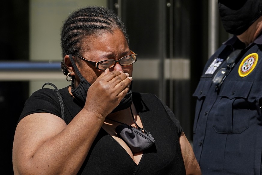A supporter of R. Kelly cries outside federal court, Wednesday, June 29, 2022, in the Brooklyn borough of New York. R&amp;B star R. Kelly was sentenced to 30 years in prison Wednesday in a federal sex ...