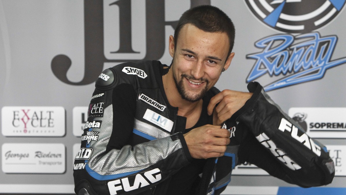 Moto2 rider Randy Krummenacher of Switzerland prepares for the third free practice session ahead of Sunday's Malaysian Motorcycle Grand Prix in Sepang, Malaysia, Saturday, Oct. 24, 2015. (AP Phot ...