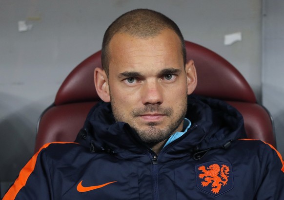 FILE - In this Tuesday Nov. 14, 2017 file photo Netherlands&#039; Wesley Sneijder looks out from the bench prior to the start of a during the international friendly soccer match between Netherlands an ...