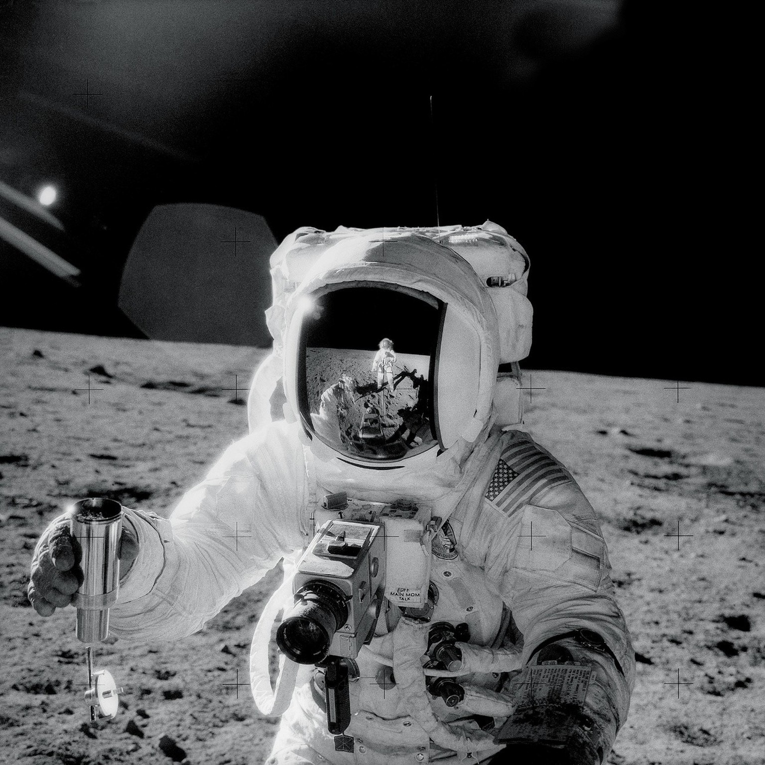 epa06766295 A handout photo made available by NASA on 27 May 2018 shows Apollo 12 astronaut Alan Bean holding a special environmental sample container filled with lunar soil collected during his sojou ...