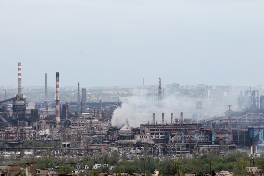 Smoke rises from the Metallurgical Combine Azovstal in Mariupol, in territory under the government of the Donetsk People's Republic, eastern in Mariupol, Ukraine, Thursday, May 5, 2022. Heavy fig ...