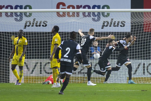 From left, Kacper Przybylko (LUG), Renato Steffen (LUG) and Hadj Mahmoud (LUG), celebrate 2-0 goal, during the Super League soccer match FC Lugano against BSC Young Boys at the Cornaredo Stadium in Lu ...