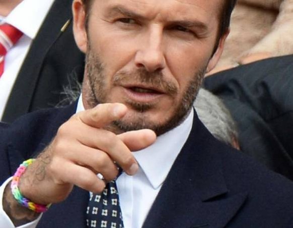 David Beckham mit, naja, «modischem» Loom Band.
