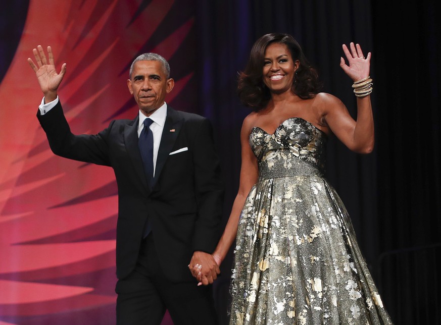 FILE - This Sept. 17, 2016 file photo shows President Barack Obama and first lady Michelle Obama at the Congressional Black Caucus Foundation&#039;s 46th Annual Legislative Conference Phoenix Awards D ...