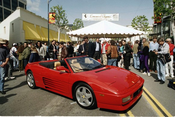 File - In this Saturday Feb. 27, 1993 file photo, a new Ferrari 348 Spider convertible makes its debut on Rodeo Drive in Beverly Hills, Calif. Road-worthy vehicles have become the cornerstone of the c ...