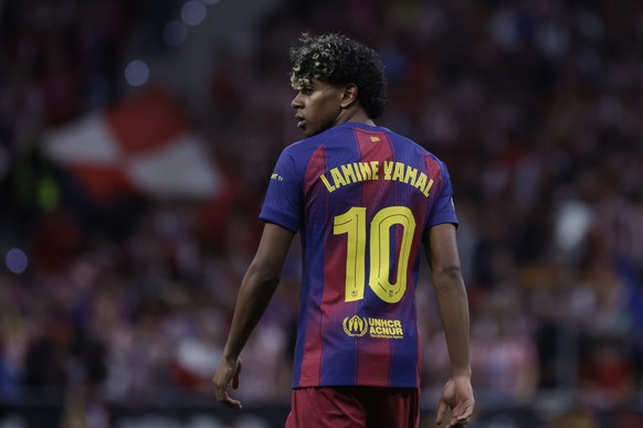 epa12890472 Barcelona's Lamine Yamal looks on during the UEFA Champions League quarter-finals 2nd-leg soccer match between Atletico de Madrid and FC Barcelona at the Metropolitano stadium in Madr ...