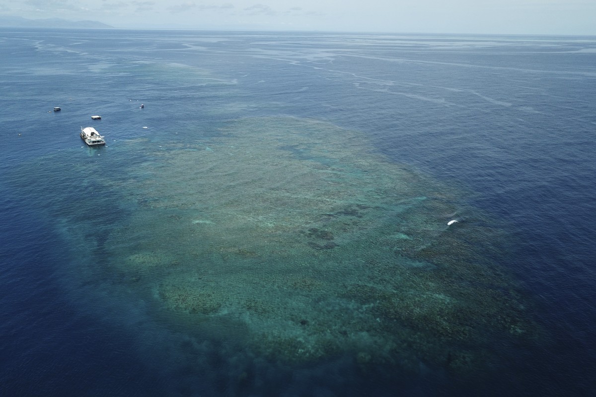 The Remoora pontoon, owned by Reef Magic, sits above a section of the Great Barrier Reef above Moore Reef in Gunggandji Sea Country off coast of Queensland in eastern Australia on Nov. 14, 2022. (AP P ...