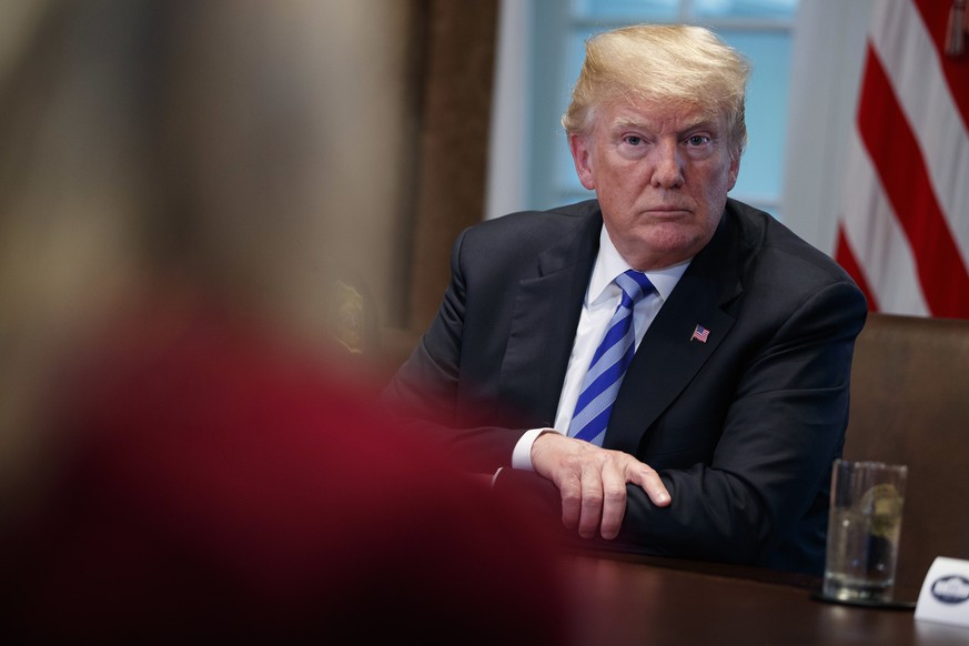 President Donald Trump listens during a roundtable on immigration policy in California in the Cabinet Room of the White House, Wednesday, May 16, 2018, in Washington. (AP Photo/Evan Vucci)