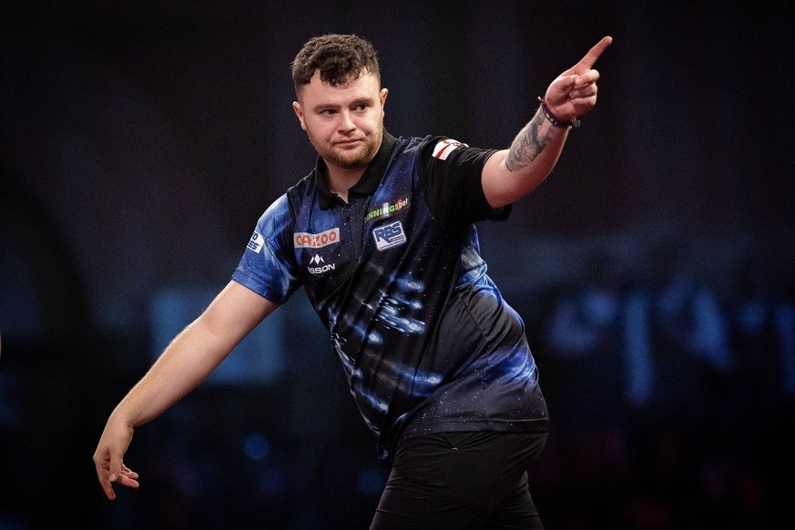 Darts PDC World Darts Championship Josh Rock Northern Ireland reacts in his Third Round match against Nathan Aspinall England not in picture during the PDC World Darts Championship 2022 at Alexandra P ...