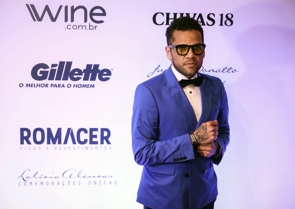 epa06044707 Brazilian player Dani Alves attends a charity auction organized by Brazilian soccer player Neymar and the Brazilian national soccer team in Sao Paulo, Brazil, 22 June 2017. EPA/FERNANDO BI ...