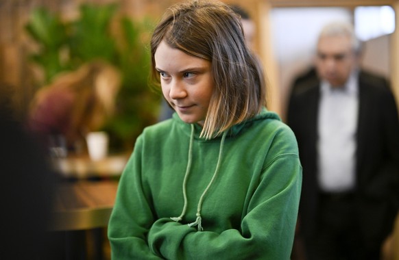 epa10415167 Climate activist Greta Thunberg of Sweden arrives to a press conference on the set of CNBC, on the sideline of the 53rd annual meeting of the World Economic Forum, WEF, in Davos, Switzerla ...