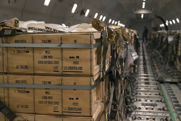 FILE - In this image provided by the U.S. Air Force, pallets of ammunition, weapons and other equipment bound for Ukraine are loaded on a plane by members from the 436th Aerial Port Squadron during a  ...