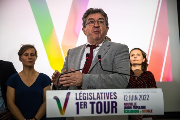 epa10010170 Jean-Luc Melenchon leader of the &#039;NUPES&#039; (Nouvelle Union Populaire Ecologique et Sociale) a coalition of Leftist and Ecologist parties delivers a speech surrounded by parties mem ...