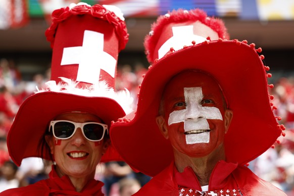 epa11411859 Supporters of Switzerland before the UEFA EURO 2024 group A match between Hungary and Switzerland in Cologne, Germany, 15 June 2024. EPA/YOAN VALAT