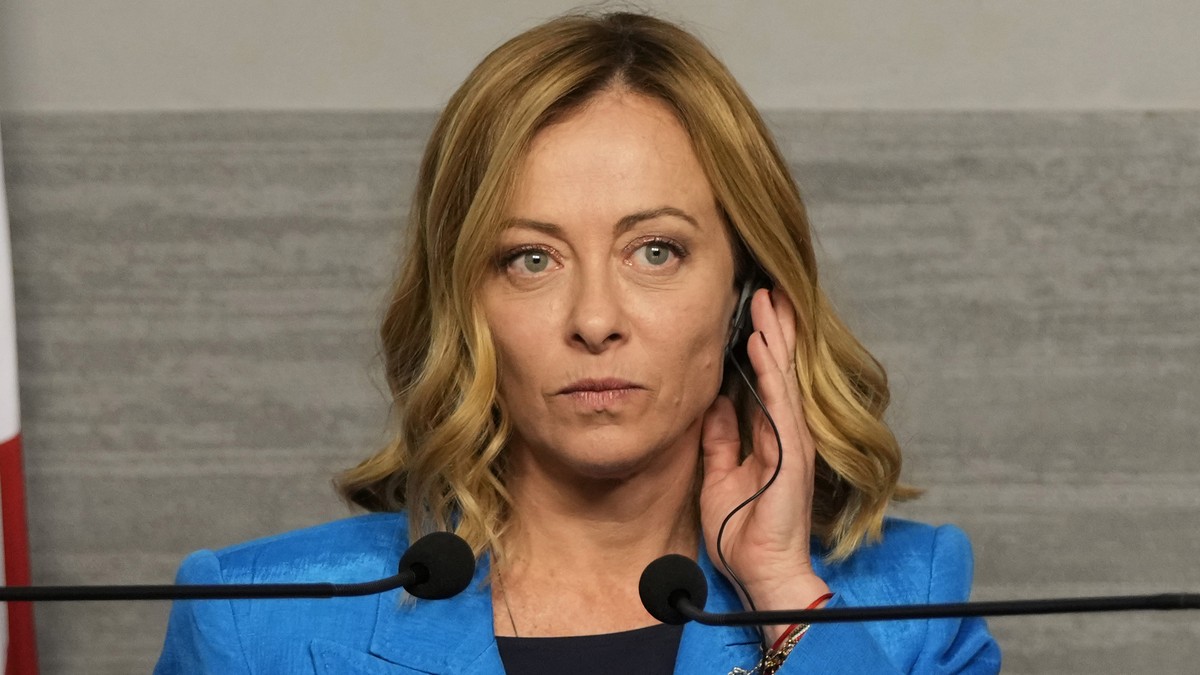 Italian Premier Giorgia Meloni, adjusts her headphone during a joint press conference with Lebanon?s caretaker prime minister Najib Mikati, Friday, Oct. 18, 2024, in Beirut, Lebanon. (AP Photo/Hassan  ...