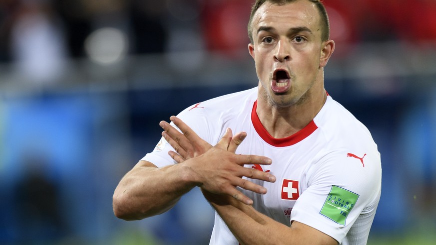 Switzerland&#039;s midfielder Xherdan Shaqiri celebrates after scoring the winning goal during the FIFA World Cup 2018 group E preliminary round soccer match between Switzerland and Serbia at the Aren ...