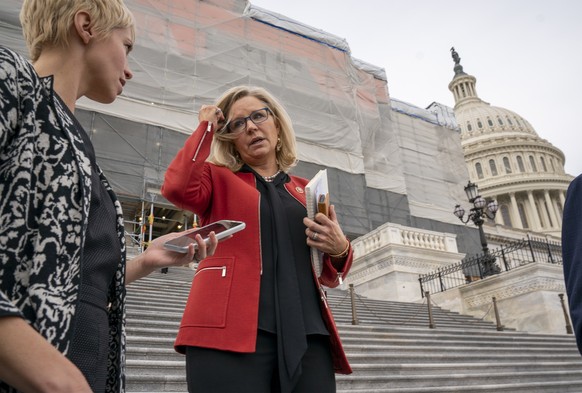 FILE - In this Jan. 10, 2020, file photo, Rep. Liz Cheney, R-Wyo., speaks with reporters as lawmakers leave the Capitol in Washington. The Wyoming Republican Party voted overwhelmingly Saturday, Feb.  ...