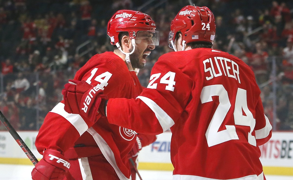 Detroit Red Wings center Robby Fabbri (14) celebrates with center Pius Suter (24) after scoring against the Vegas Golden Knights during the first period of an NHL hockey game Sunday, Nov. 7, 2021, in  ...