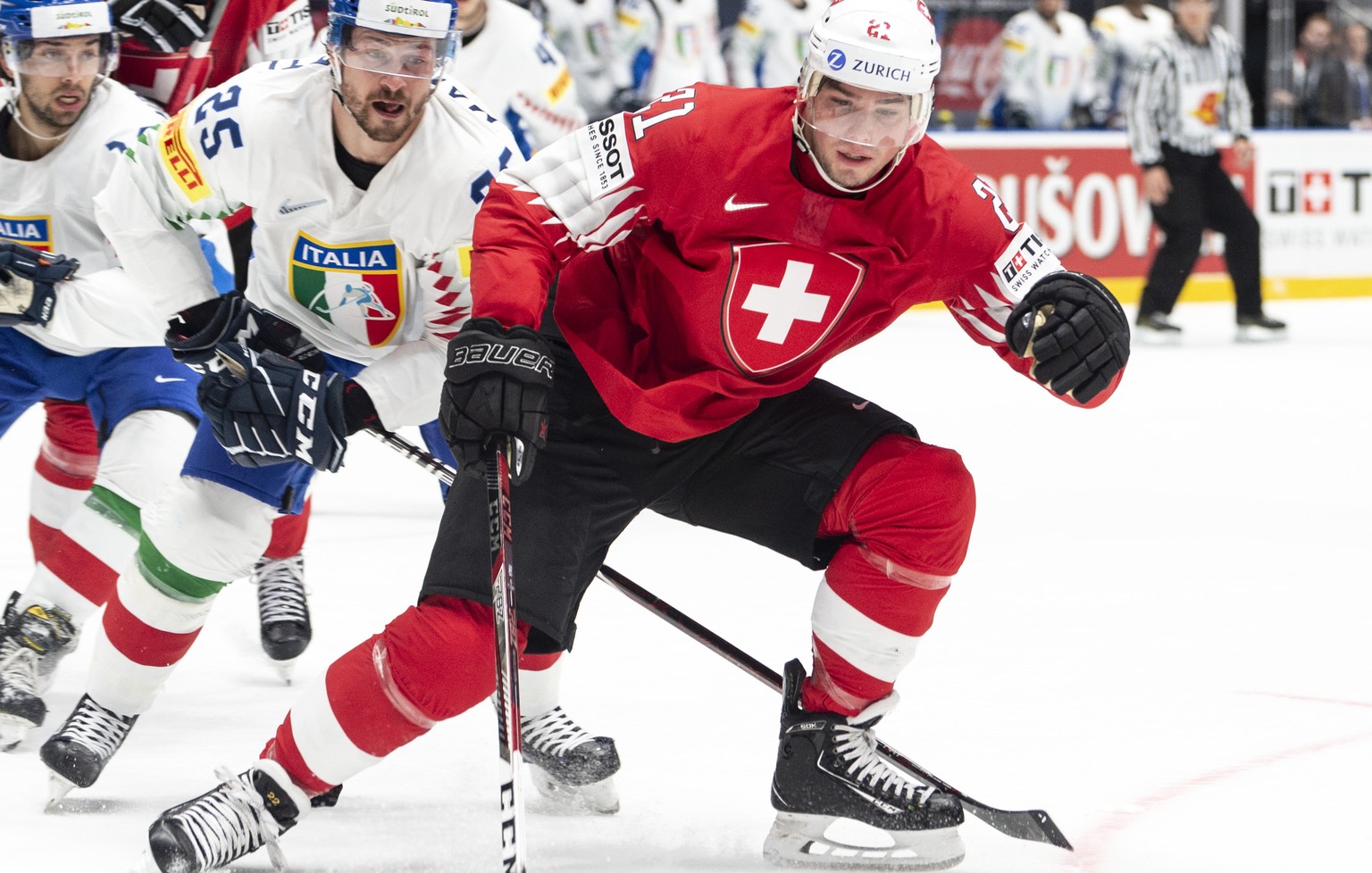 Italy`s Stefano Marchetti , left, agaist Switzerland&#039;s Kevin Fiala during the game between Switzerland and Italy, at the IIHF 2019 World Ice Hockey Championships, at the Ondrej Nepela Arena in Br ...