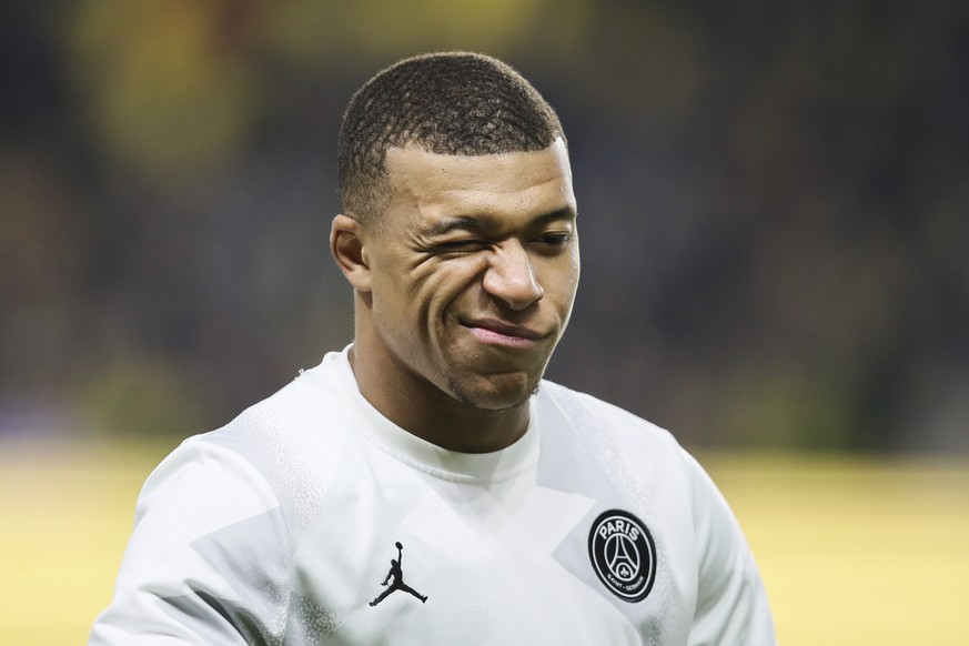 PSG&#039;s Kylian Mbappe walks onto the pitch prior to the League One soccer match between Nantes and Paris-Saint-Germain, in Nantes, western France, Tuesday, Feb. 4, 2020. (AP Photo/David Vincent)