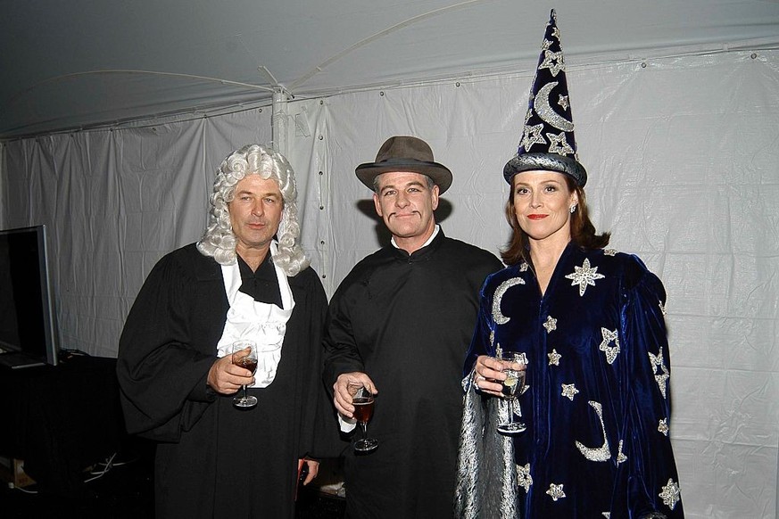 NEW YORK CITY, NEW YORK - OCTOBER 26: (L-R) Alec Baldwin, Jim Simpson and Sigourney Weaver attend Halloween Ball for the Central Park Conservancy at Rumsey Field on October 26, 2005 in New York City.  ...