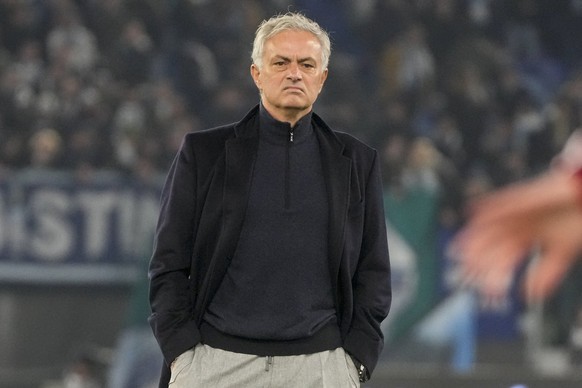 Roma&#039;s head coach Jose Mourinho stands on the pitch during his team&#039;s warm up ahead of the quarterfinal Italian Cup soccer match between Lazio and Roma at Rome&#039;s Olympic Stadium, Wednes ...