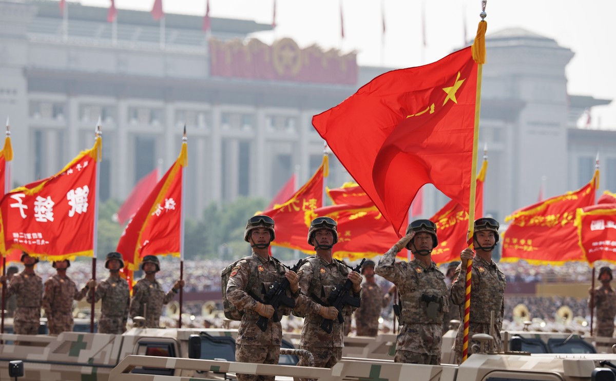 epaselect epa12347363 Chinese troops on armoured vehicles march during a military parade marking the 80th anniversary of the end of the Sino-Japanese War in Beijing, China, 03 September 2025. China ho ...