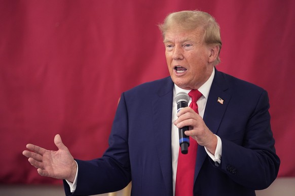 Republican presidential candidate and former President Donald Trump speaks to Texas state troopers and guardsmen at the South Texas International Airport, Sunday, Nov. 19, 2023, in Edinburg, Texas. (A ...